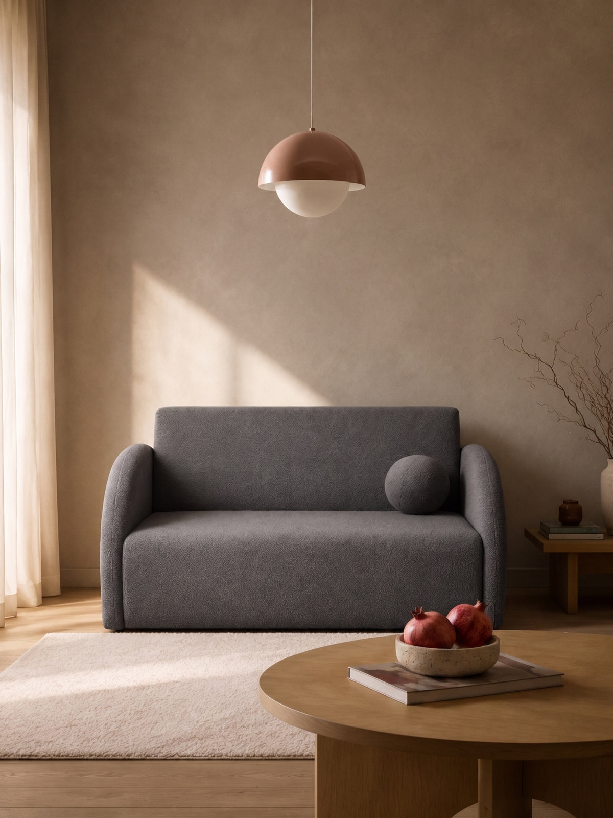 Nubi kihúzható kanapé 120 cm szürke boucle tárolóval és párnával modern lakásban