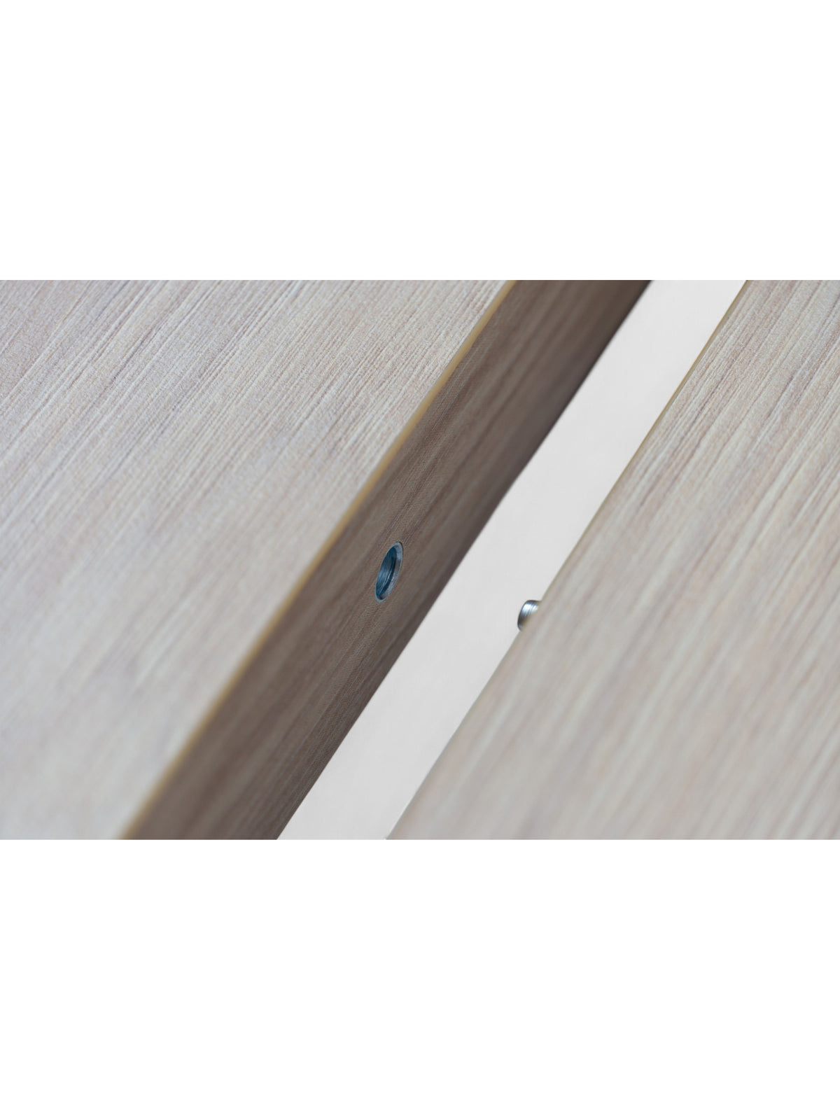 Kerek, kihúzható Cedrus Linear asztal 95 cm, dąb hikora laminált felülettel és fekete fém vázzal, asztallap részlet