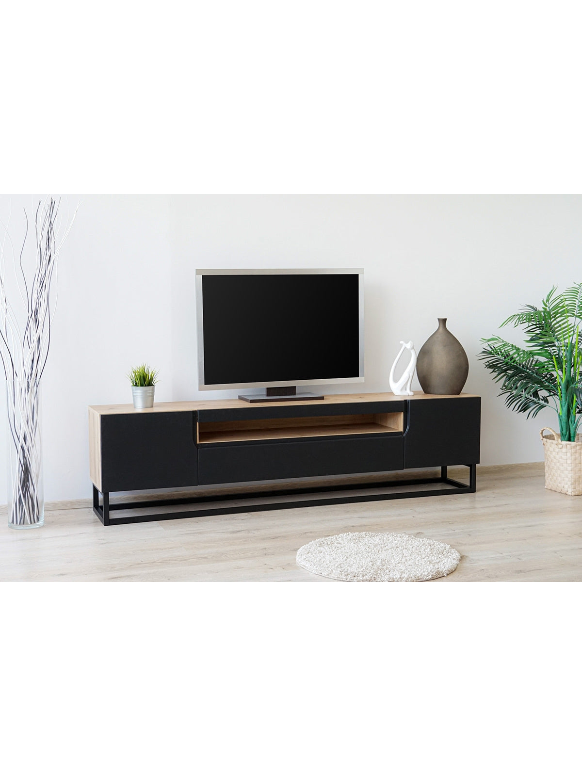 Szafka RTV Loftia 200 cm z wnęką, front ryflowany czarny mat, korpus dąb artisan